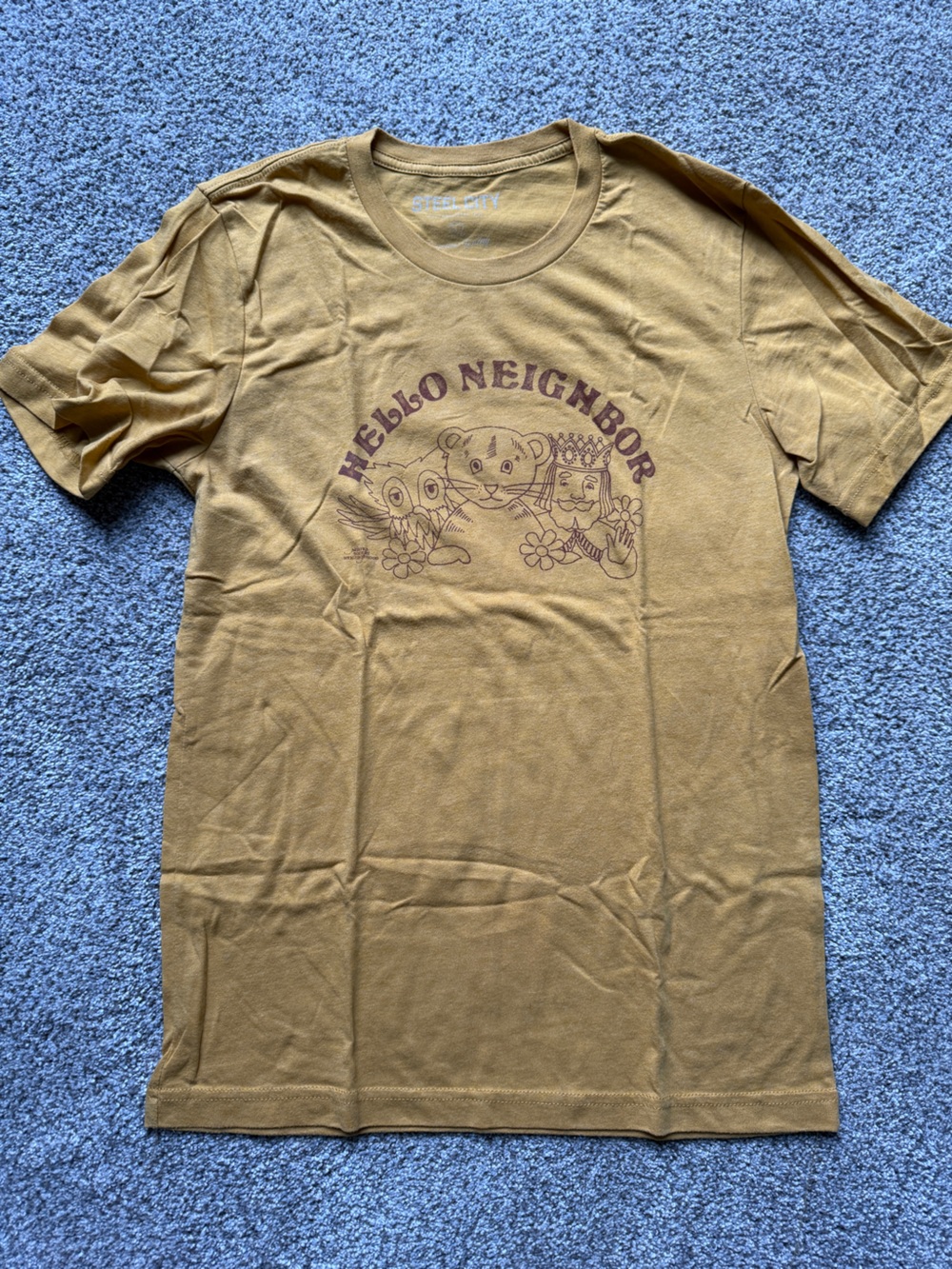 Mr. Rogers’ Neighborhood Hello Neighbor Mustard Short Sleeve Graphic Tee